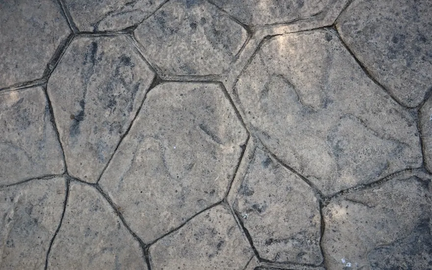 Random-stone stamped surface after a few seasons of use